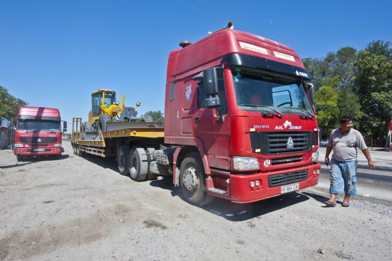 Driver Dilmurat Matkalimov is carrying machinery to South Kazakhstan oblast 22 Aug.2011 Zhambyl oblast.