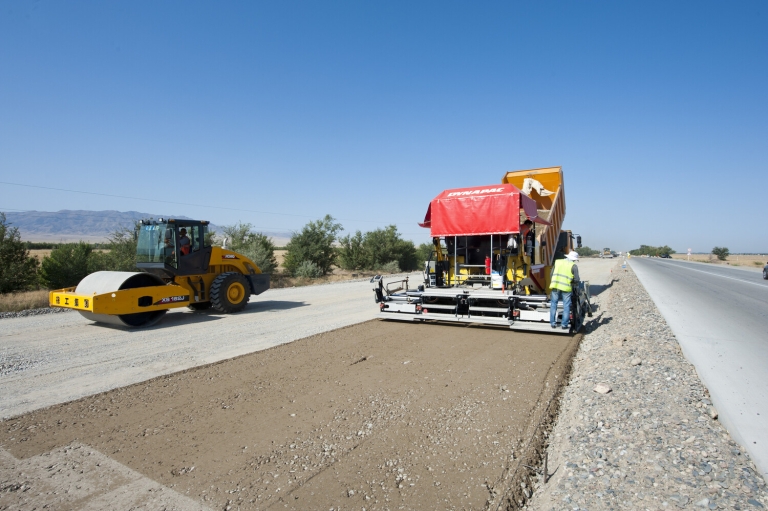 Works are underway by KCC South Korean company. Lean concrete is being laid on the road base. Zhambyl oblast. 23 Aug. 2011. ADB section.
